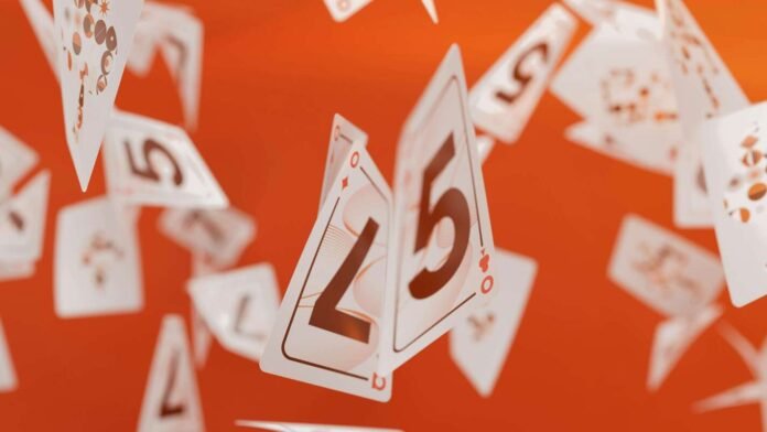 Tikėjimas skaičiais – krentančios kortos simbolizuoja atsitiktinumą ir žmonių norą rasti dėsningumą.